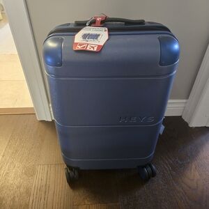 Heys Navy Spinner Carry On Luggage